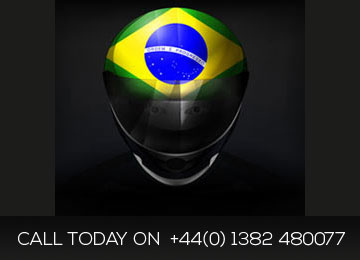 racing driver with brazil flag on his helmut